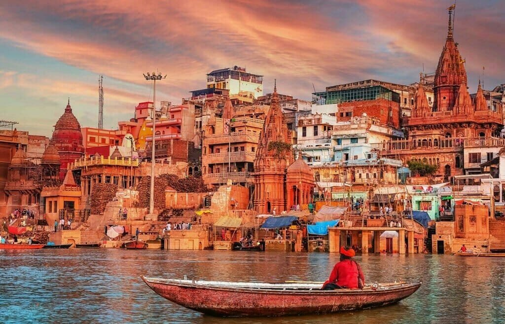A mesmerizing view of the Ganges River and the ghats in Varanasi, India, during sunrise.